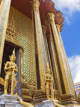 Guards of the temple Wat Phra Kaew in the Grand Palace in bangkok, Thailand