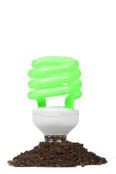 Conceptual  Energy saving lamp with green spiral on the white background 