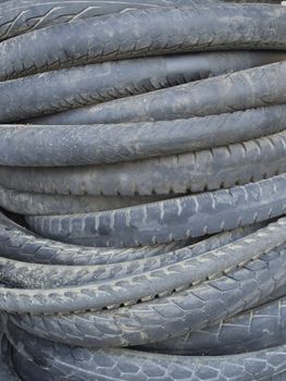 Background made of stack of used motorcycle tires