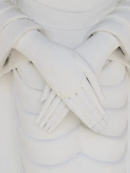 Folded hand of Buddha at temple in Thailand