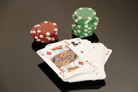 poker cards with many chips