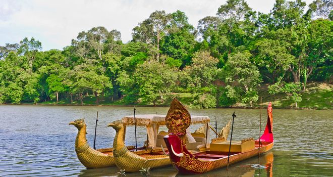 Traditional cambodian boats by the river Bayon - Angkor, Cambodia, Southeast Asia