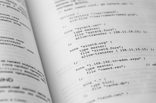 Programming textbook page with small source code script sample