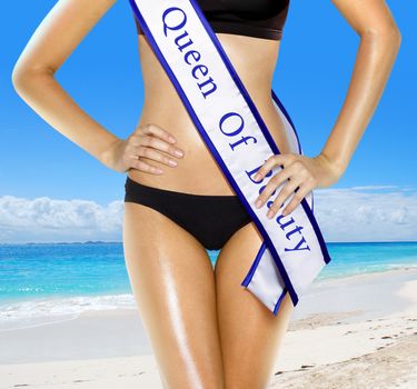 part of woman shape of beautiful thigh in bikini with white tape of beauty contest