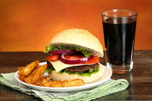 Close up of big tasty burger, french fries and soda pop