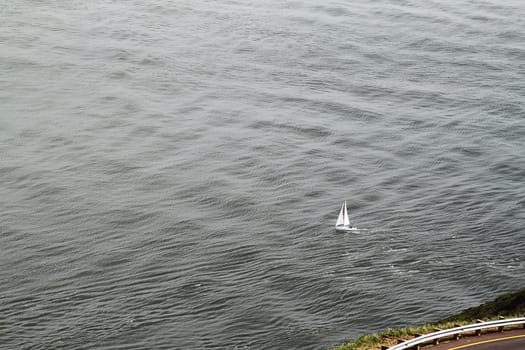 Sailboat in a bay near the coast