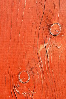 Detail of shelled wooden desk painted in bright red