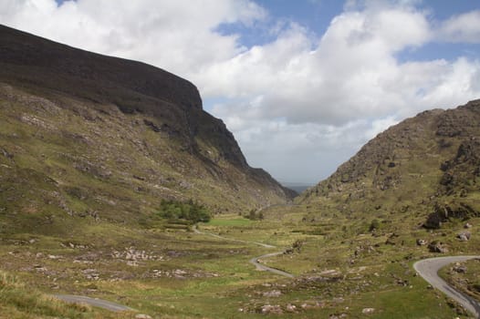 The gap of Dunloe, in Ireland, with clouds.