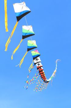 CHA-AM - MARCH 10: Colorful kites in the 12th Thailand International Kite Festival on March 9, 2012 in Naresuan Camp, Cha-am, Thailand