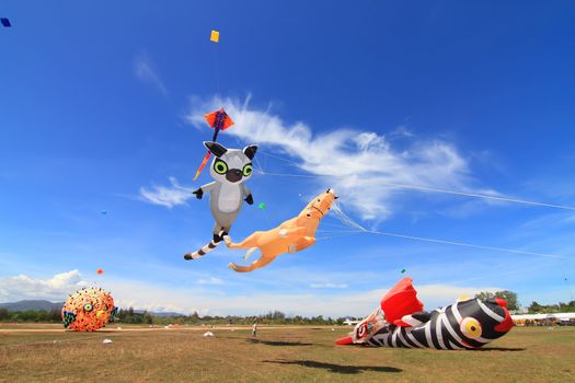 CHA-AM - MARCH 10: Colorful kites in the 12th Thailand International Kite Festival on March 9, 2012 in Naresuan Camp, Cha-am, Thailand