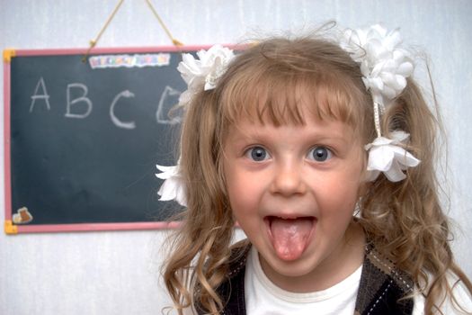 An image of girl on a first lesson at school