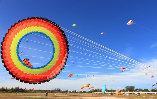 CHA-AM - MARCH 10: Colorful kites in the 12th Thailand International Kite Festival on March 9, 2012 in Naresuan Camp, Cha-am, Thailand