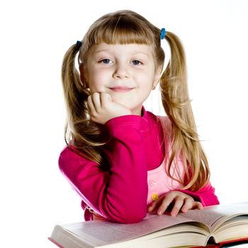 An image of a nice little girl with a book