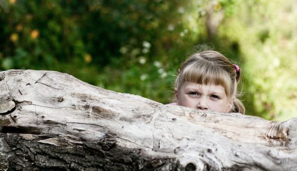 An image of little girl playing outdoor