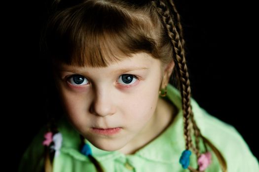 Stock photo: an image of a little girl with pigtails
