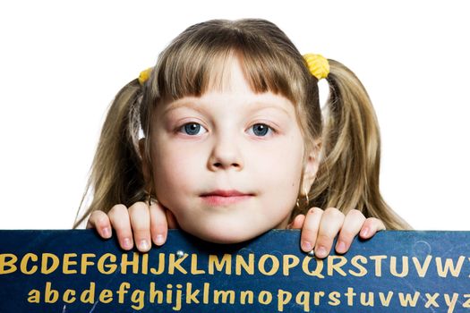 An image of a little girl with a  blackboard