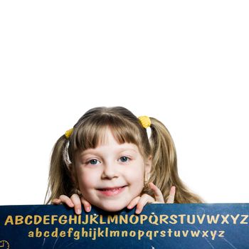 An image of a smiling girl and blackboard