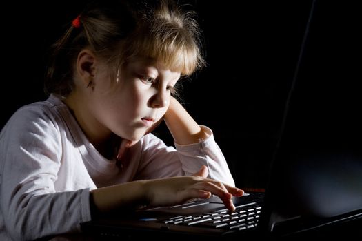 An image of a little girl with notebook