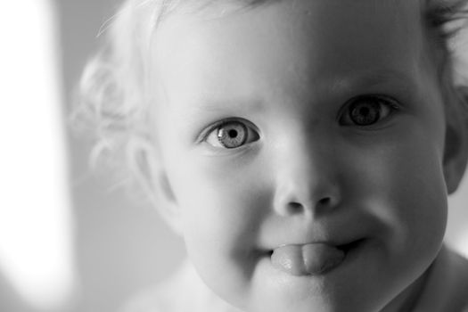 An image of cute baby in a studio