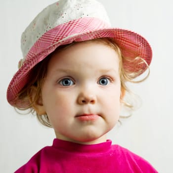Stock photo: an image of a nice baby in a pink hat 