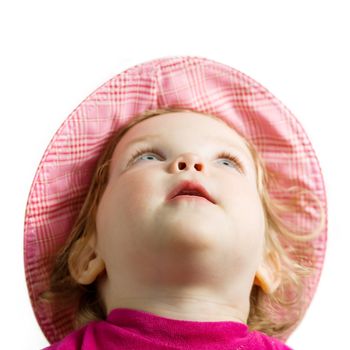 Stock photo: an image of a baby in a hat looking up
