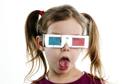 Humorous image of excited child in 3-D glasses with white background.