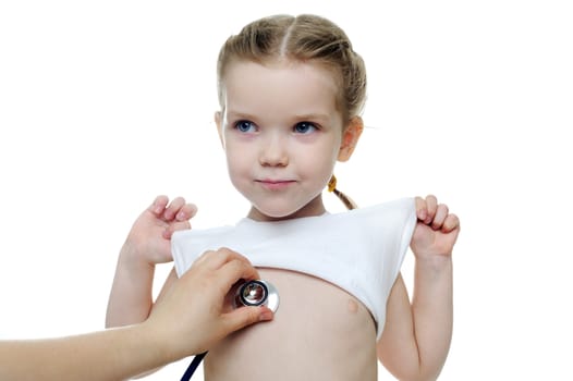 An image of a little girl being listened by a doctor