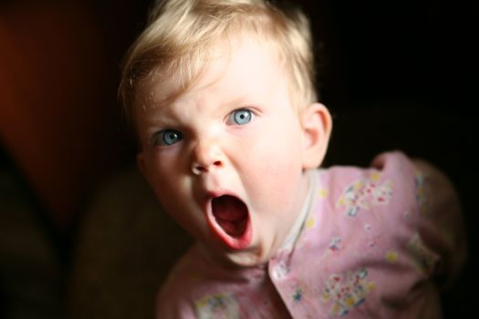 An image of yawning baby
