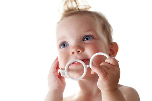 An image of baby with toy glasses