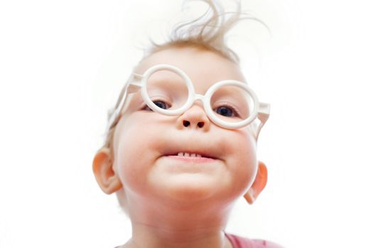 An image of a baby-girl in toy-glasses
