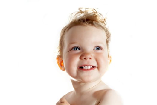 An image of smiling girl. Isolated in studio.