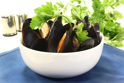 fresh mussels cooked in a white bowl