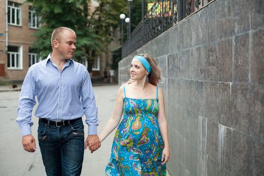 An image of a young couple having a walk