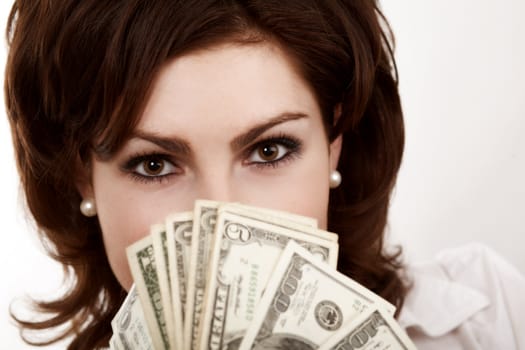 A face of girl with dollars close-up