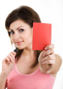 An image of a nice woman showing red card