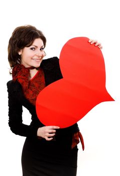 A nice girl keeps a big red paper heart