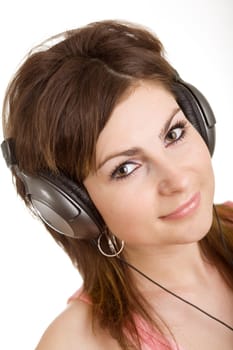 The woman in headphone listening to music