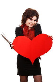 A woman with a sly look keeps a red paper heart