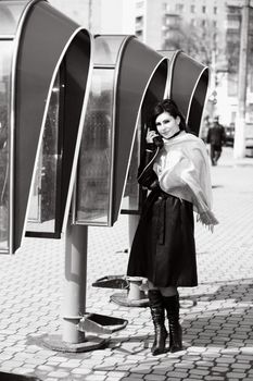 An image of a nice girl speaking on telephone