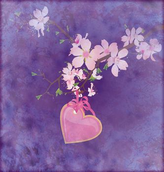 pink heart hanging on the blooming tree brunch on grunge dark blue background