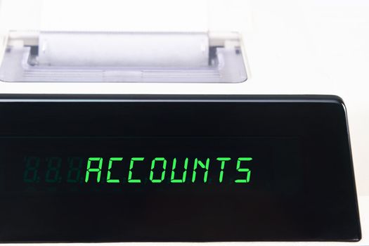 Close up of an LED calculator screen, displaying the word ACCOUNTS in capital letters.