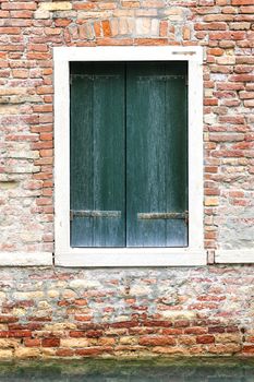 Windows of old house in Venice, Italy