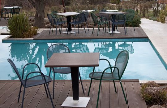 stylish coffee bar with pool in early spring