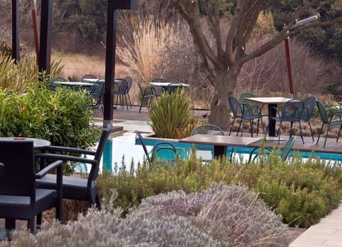 stylish coffee bar with pool in springtime