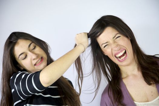 girl pulling hair angry fighting