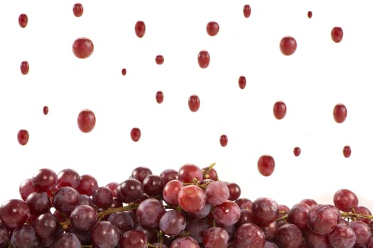 Picture of raining grapes and a ground of grapes..