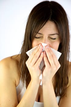 Sick girl sneezes strong