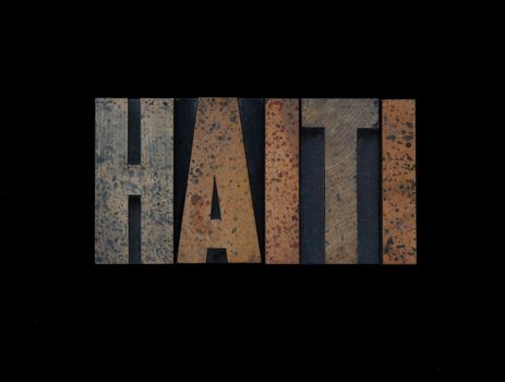 the word Haiti in old wood type