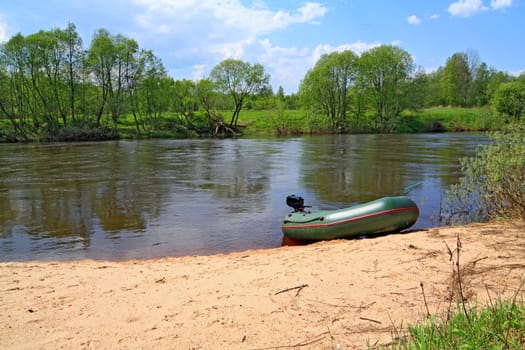 motor boat on river coast