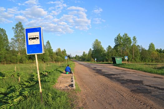 bus stop on rural road